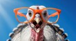 © Alice C - A turkey wearing bright orange glasses looks directly at the camera against a blue sky. The bird's face shows detailed features with an open beak. Great for funny holiday cards or humor.