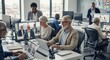 © Hungarian - Mature business professionals collaborate in a modern office environment while engaging in a video conference