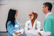 © Malik Nalik - A diverse medical team collaborates discussing patient care in a hospital. The healthcare professionals dressed in uniforms share their expertise and insights to provide the best possible treatment.