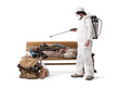 © amedeoemaja - Homeless Man Lying on Wooden Bench while a Pest Control Worker sprays him on White Background