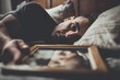 © Studicon - Man lying on bed gazes at picture frame with melancholy expression