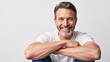 © Lynchsz - Smiling handsome mature man with beard wearing a white casual t-shirt on white background