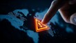 © habbi - Urgent global alert triggered on interactive world map with finger pressing the danger sign for cybersecurity threat awareness and risk management