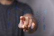 © vegefox.com - Hand touching digital interface representing human connections, social media, networking, global business, team