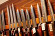 © 9parusnikov - Display of Japanese Kitchen Knives on Wooden Wall