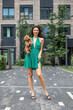 © Andrey_Arkusha - Lady with puppy dog. Young beautiful woman walks with her poodle dog