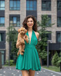 © Andrey_Arkusha - Lady with puppy dog. Young beautiful woman walks with her poodle dog