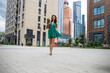 © Andrey_Arkusha - Lady with puppy dog. Young beautiful woman walks with her poodle dog