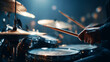 © Karo - Close-up of the hands playing drums on stage, musical background. drums and drumsticks close up.