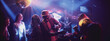 © Videophilia - Party atmosphere in a club with a DJ, vibrant lights, and dancing guests during an exciting evening event