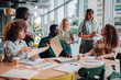© Zamrznuti tonovi - Diverse startup team collaborating during a business meeting