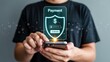 © MediaStockAI - Person interacts with a glowing digital security shield displaying payment authentication on a mobile device