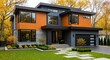 © INDAH - A stunning view of a newly built, two-story modern residential home featuring a stylish blend of charcoal gray, wood-like orange paneling, and large windows, surrounded by vibrant autumn trees and a m