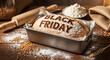 © tae - Bakery loaf baked with Black Friday text in pan surrounded by rolling pin and flour for holiday shop 36415600 1