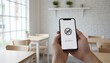 © olga_demina - Person is holding a modern mobile phone displaying a no service message and a crossed out signal icon, illustrating communication issues or a dropped network connection