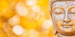 © NeuroCake - Serene face of a golden Buddha statue in meditation. Spiritual zen background with yellow bokeh for mindfulness and relaxation