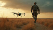 © Viktor - Soldier in military uniform walks with drone at sunset in field. UAV flies near the man. Modern warfare tech, air force combat operation. Concept of army and technology.