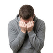 © Zaz - Man In Gray Hoodie Hiding Face With Hands Demonstrating Sadness Grief And Despair Isolated On Black Background