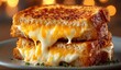 © Alexei - Grilled cheese sandwich stacked high with melted cheese oozing from crispy golden-brown bread, garnished with fresh herbs, creating a delicious and comforting culinary experience