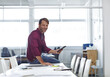 © peopleimages.com - Design, smile and tablet with portrait of man in office for planning, research and review. App, creative and scrolling with happy designer in workplace for development, information or schedule