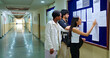© Raushan_films - Indian gen z busy pupil boy girl look notice board do check study course exam dates results report. Serious young adult male man lady female wear bag read news post paper hallway college campus place