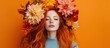 © tetxu - Portrait of a beautiful redheaded woman wearing a crown of colorful autumn flowers.