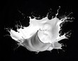 © Bojol - Bold, dynamic splash of creamy white liquid frozen mid-air against a stark black background; a moment captured