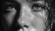 © Audrey - A woman gazes intensely, her face glistening with tears in a black and white setting, capturing a moment of raw emotion and vulnerability in her expression.