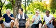 © Rawpixel.com - Group of diverse senior people sit and talk at park, happy group. Diverse senior friends sitting, enjoy park exercise. Happy smiling seniors, active outdoors lifestyle, diverse senior group