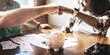 © Rawpixel.com - Two people fist bump over table with a piggy bank, teamwork and savings. Diverse man and woman fist bump on financial planning. Couple fist bump teamwork on financial, accounting and investment topic