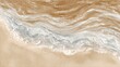 © mila103 - Gentle waves flow onto a sandy shore creating a harmonious blend of white foam and golden grains. Soft natural light highlights the textures of the water and sand.