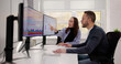 © Andrey Popov - Team Of Analysts Reviewing Business Data
