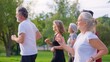 © Iván Moreno - Senior athletic friends jogging together in a park