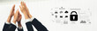 © InfiniteFlow - Hands join together in a corporate setting with digital security icons, symbolizing teamwork, collaboration, and the importance of data protection in the modern workplace. Trope