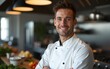 © handong - Portrait of a young male chef in professional kitchen. High quality