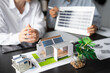 © Charlie's - Solar panels green energy Business man working green eco friendly office business creative idea Planing Bio economy for business eco friendly professional Engineer sustainable electricity.