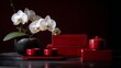 © Irina - Traditional tea ceremony setup with red lacquer boxes and blooming orchids