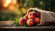© Maryna - Fresh peaches spill from a burlap sack, resting on a rustic wooden table, with soft sunlight filtering through the background.