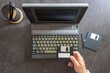 © Rodrigo - hands of a man working with floppy disks