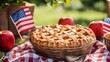 © Art By Ahmar - Homemade lattice apple pie served outdoors with small american flags