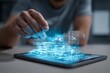 © grey - Hand manipulating a glowing holographic model projected above a digital tablet.