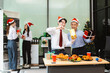 © NINENII - Asian people, celebrating together and gift exchange at Merry Christmas & Happy New Year. excited businessman feel happy work complete and celebration successful deal.