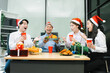 © NINENII - Asian people, celebrating together and gift exchange at Merry Christmas & Happy New Year. excited businessman feel happy work complete and celebration successful deal.