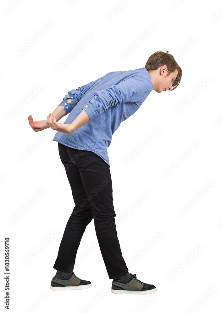 Stoopingly Side view young male student in stooped pose, leaning forward with his ...