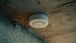 © Ferman Bagus Istuhri - Smoke detector installed on concrete ceiling