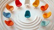 © Bintang - A top-down view of colorful chairs arranged in a circle on a white, textured background. The chairs are different colors and have a modern design.