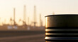 © MD NAZMUL - Oil Barrel at Sunset with Oil Derricks in Background