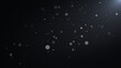 © Alesia - Abstract particles background of white and grey dust particles flying up illuminated by a soft light ray. Cinematic dust particles on a black background with bokeh.