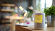 © Kateryna - Close up of a smart speaker on a shelf with a sticky note “mute” but blurred unreadable background defocused privacy habit smart speaker mute home privacy cyber hygiene