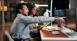 © P2000/peopleimages.com - Pointing, meeting and business people on computer at night for finance review, investment and budget report. Office, working late and workers on tech for financial analytics, research or stock market